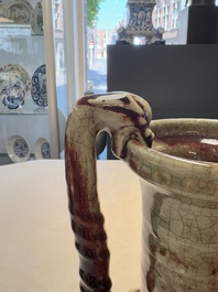 A Chinese peachbloom-glazed vase with dragon-form handles, 18th C.