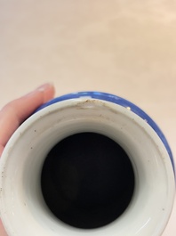 A Chinese blue and white powder-blue-ground 'Zhang Qian Cheng Cha 張騫乘槎' rouleau vase, Kangxi