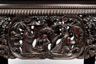 A Chinese finely carved hongmu marble top oval table, Canton, 19th C.