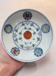 A Chinese doucai plate with stylized floral design, Chenghua mark, Kangxi/Yongzheng