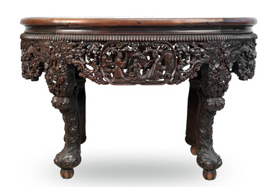 A Chinese finely carved hongmu marble top oval table, Canton, 19th C.