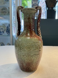 A Chinese peachbloom-glazed vase with dragon-form handles, 18th C.