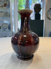 A Chinese flamb&eacute;-glazed vase with 'chilong' handles, 19th C.