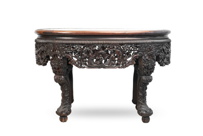 A Chinese finely carved hongmu marble top oval table, Canton, 19th C.