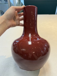 A Chinese copper-red-glazed bottle vase, 19th C.