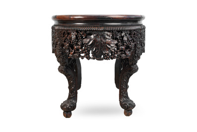 A Chinese finely carved hongmu marble top oval table, Canton, 19th C.