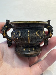 A Chinese archaistic gold and silver-inlaid bronze miniature censer, Ming
