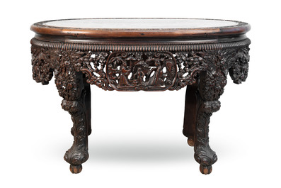 A Chinese finely carved hongmu marble top oval table, Canton, 19th C.