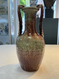 A Chinese peachbloom-glazed vase with dragon-form handles, 18th C.