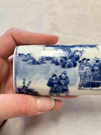 A Chinese blue and white wrist rest with figural design, 19th C.