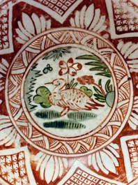 A Chinese Swatow wucai 'klapmuts' bowl with a duck, Ming