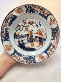 A Chinese Imari-style 'lady and boys' plate and a famille verte 'lotus' plate, Kangxi/Yongzheng