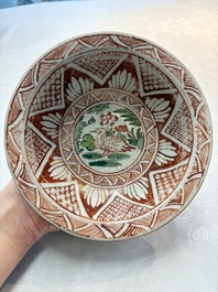 A Chinese Swatow wucai 'klapmuts' bowl with a duck, Ming