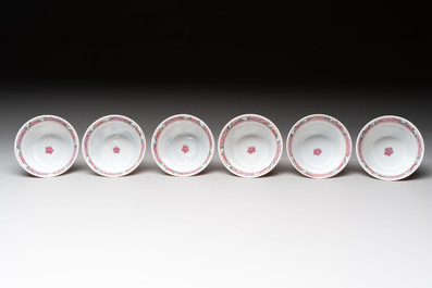 A set of six Chinese famille rose 'peonies' cups and saucers, Yongzheng/Qianlong