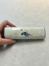 A Chinese blue and white wrist rest with figural design, 19th C.
