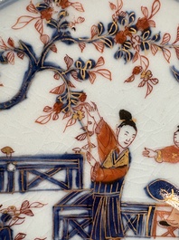 A Chinese Imari-style 'lady and boys' plate and a famille verte 'lotus' plate, Kangxi/Yongzheng