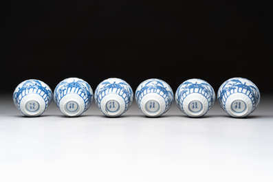 A set of six Chinese blue and white cups and saucers with floral design, Kangxi mark, 19th C.