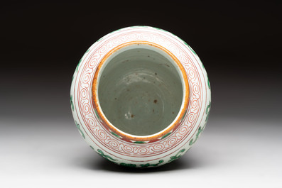 A small Chinese wucai 'Buddhist lion and peony scrolls' jar, Transitional period