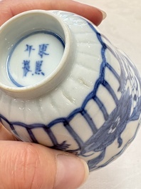 A set of six Chinese blue and white cups and saucers with floral design, Kangxi mark, 19th C.