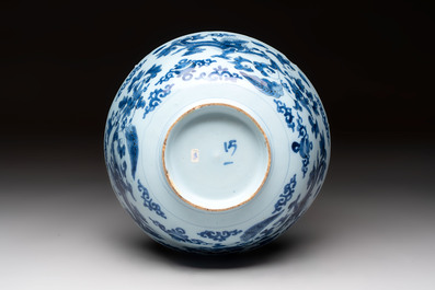 A blue and white Dutch Delft chinoiserie bowl with dragons, 17th C.