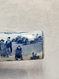 A Chinese blue and white wrist rest with figural design, 19th C.