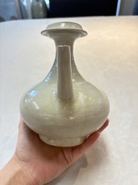 A Chinese crackle-glazed vase and a cream-glazed kendi, Tang/Song