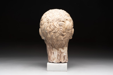 An Italian Grand Tour marble sculpture of a man's head in Roman style, probably after a bust of Caesar, 19th C.