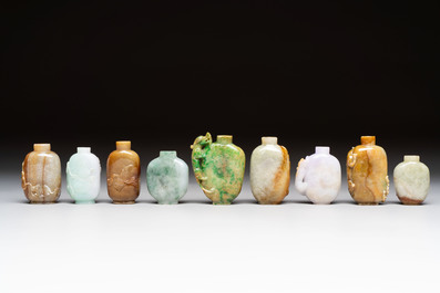 A group of nine Chinese jadeite snuff bottles, 20th C.