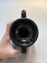 A Chinese Jizhou tortoiseshell-glazed tea bowl, a ewer and a black-glazed vase, Jin and later