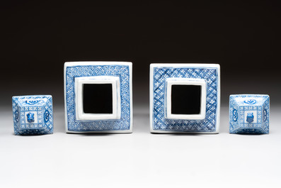 A pair of Chinese blue and white square flasks and covers with narrative design, Kangxi