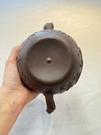 A Chinese Yixing stoneware 'squirrels among grapevines' teapot and cover, Kangxi
