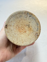 A small Chinese wucai 'Buddhist lion and peony scrolls' jar, Transitional period