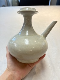 A Chinese crackle-glazed vase and a cream-glazed kendi, Tang/Song