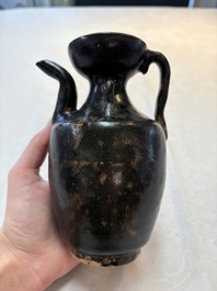 A Chinese Jizhou tortoiseshell-glazed tea bowl, a ewer and a black-glazed vase, Jin and later