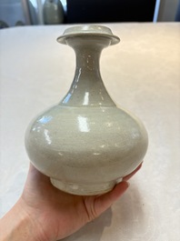 A Chinese crackle-glazed vase and a cream-glazed kendi, Tang/Song