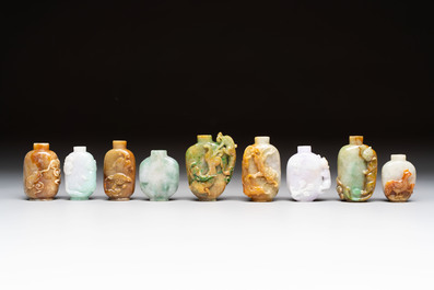 A group of nine Chinese jadeite snuff bottles, 20th C.