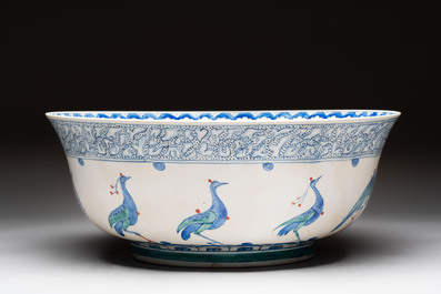 A large polychrome Iznik-style 'peacocks' bowl on a wooden stand, Samson, Paris, 19th C.