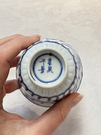 A set of six Chinese blue and white cups and saucers with floral design, Kangxi mark, 19th C.