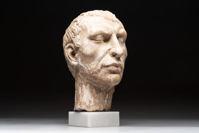 An Italian Grand Tour marble sculpture of a man's head in Roman style, probably after a bust of Caesar, 19th C.