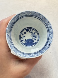 A set of six Chinese blue and white cups and saucers with floral design, Kangxi mark, 19th C.