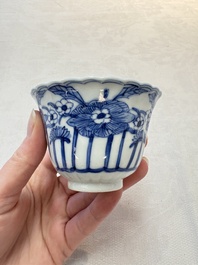 A set of six Chinese blue and white cups and saucers with floral design, Kangxi mark, 19th C.