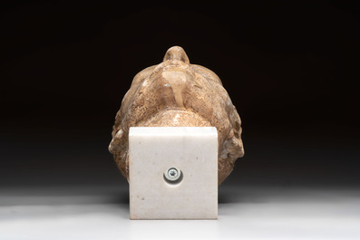 An Italian Grand Tour marble sculpture of a man's head in Roman style, probably after a bust of Caesar, 19th C.