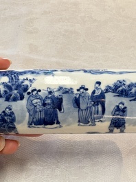 A Chinese blue and white wrist rest with figural design, 19th C.