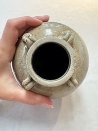A Chinese crackle-glazed vase and a cream-glazed kendi, Tang/Song