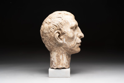 An Italian Grand Tour marble sculpture of a man's head in Roman style, probably after a bust of Caesar, 19th C.