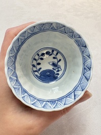A set of six Chinese blue and white cups and saucers with floral design, Kangxi mark, 19th C.