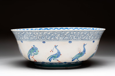 A large polychrome Iznik-style 'peacocks' bowl on a wooden stand, Samson, Paris, 19th C.
