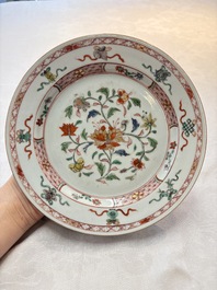 A Chinese Imari-style 'lady and boys' plate and a famille verte 'lotus' plate, Kangxi/Yongzheng