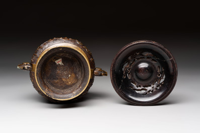 A Chinese archaistic bronze censer with a wooden cover, Xuande mark, 19th C.