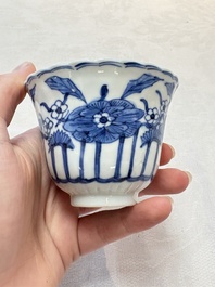 A set of six Chinese blue and white cups and saucers with floral design, Kangxi mark, 19th C.